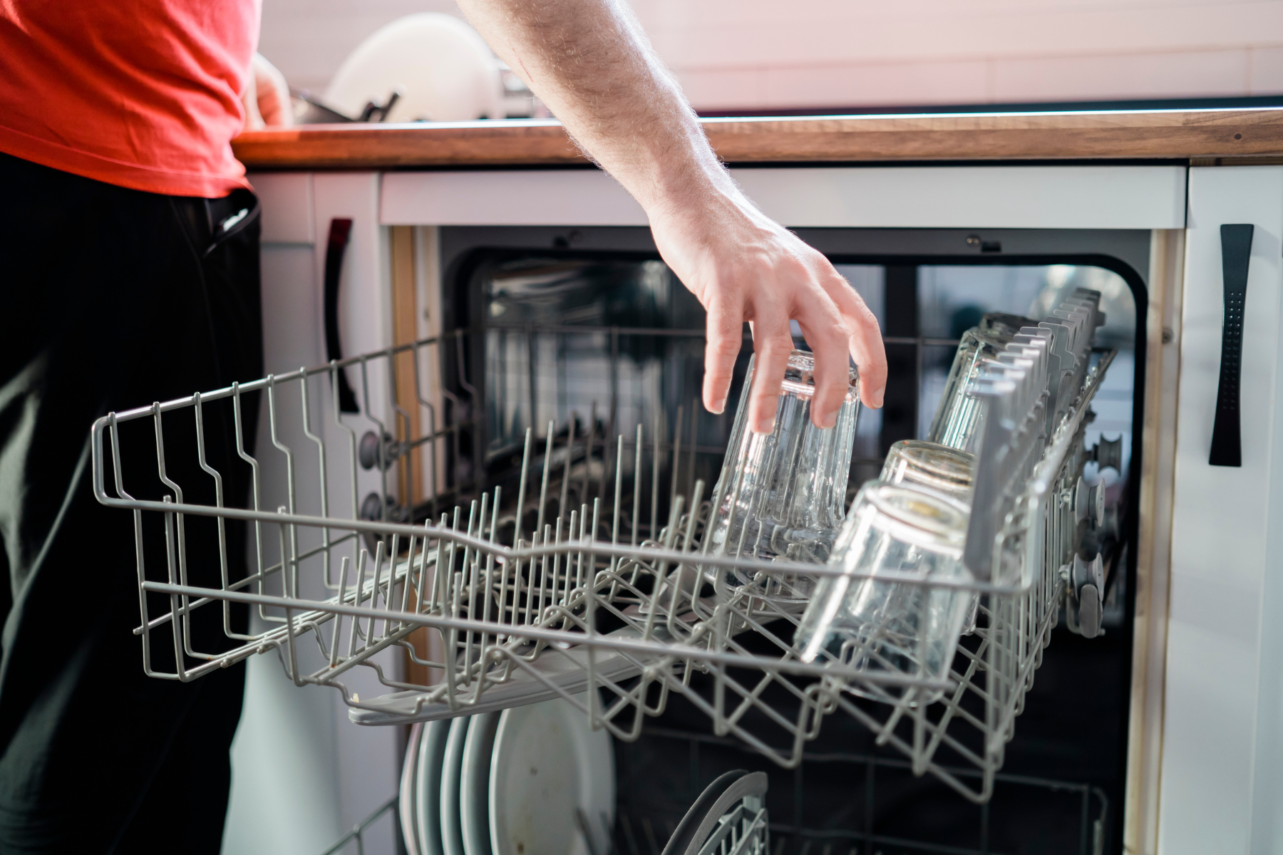 Loading Dishwasher Loading Dishes into Dishwasher