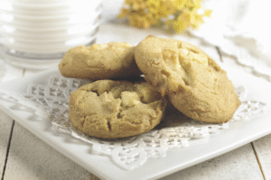 White Chocolate Macadamia Nut Cookie Dough White Chocolate Macadamia Nut cookies on a plate